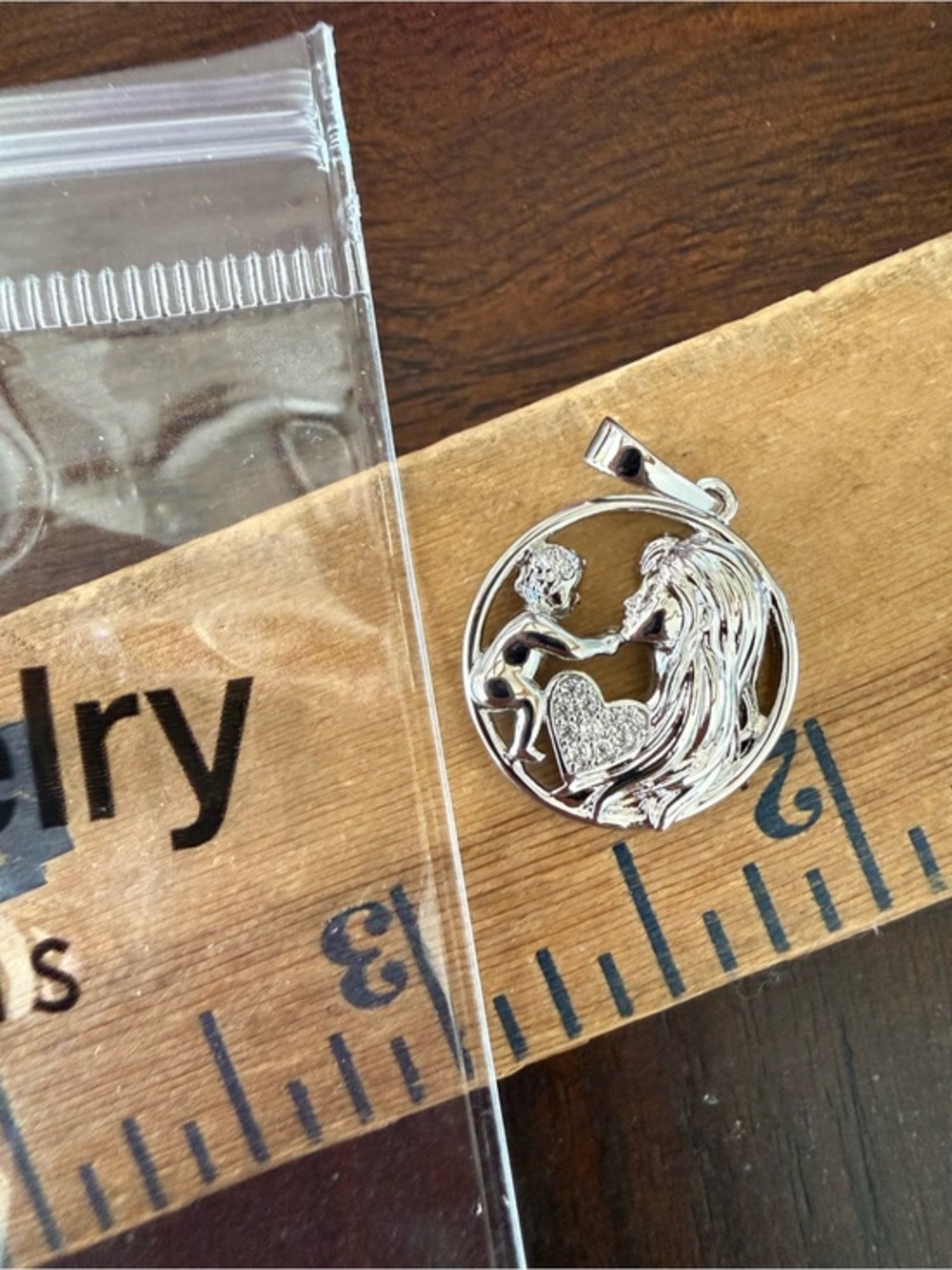 New XP Sterling Silver Pendant